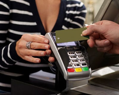 contactless payment with rfid card at terminal in a store