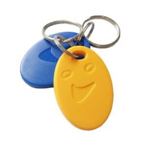 two rfid keyfobs in yellow and blue with smiley shape