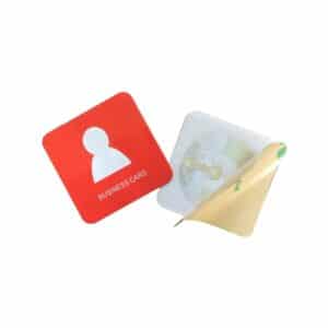 square rfid sticker/label in red with design in white plus adhesive layer on back
