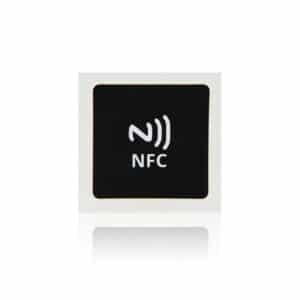 black nfc sticker with adhesive back layer from front view